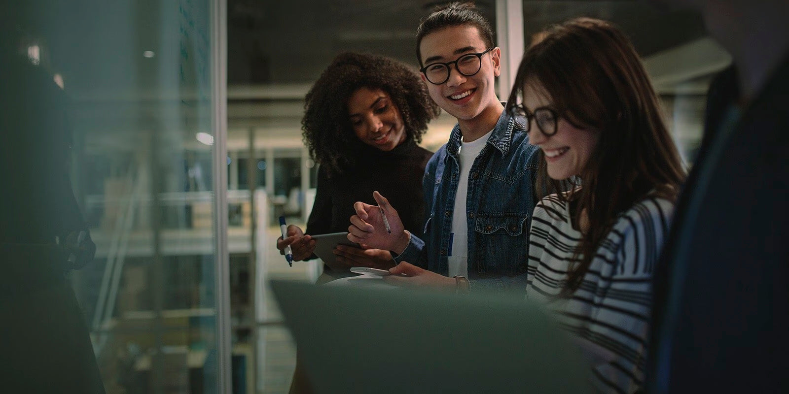 College students collaborating in a classroom